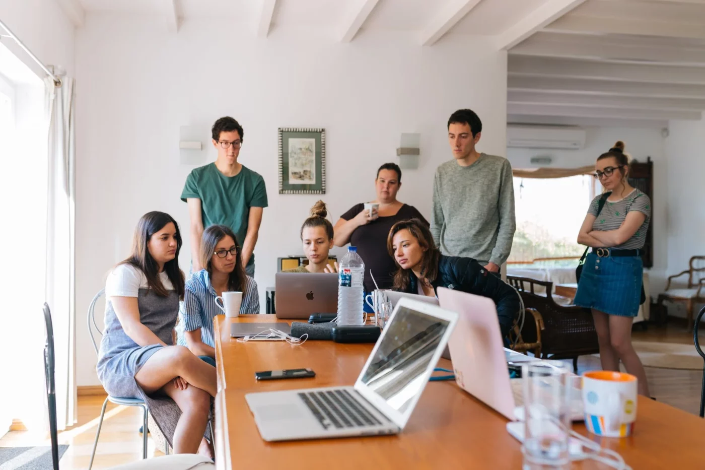 A group of people around a table