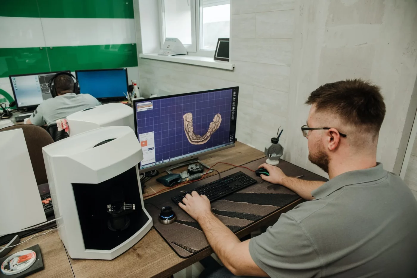 Specialist working on a computer