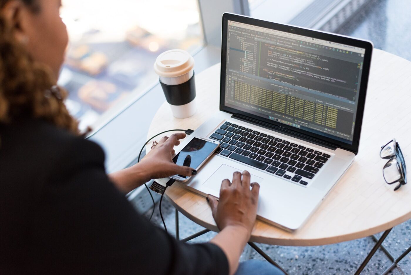 A developer working on a laptop