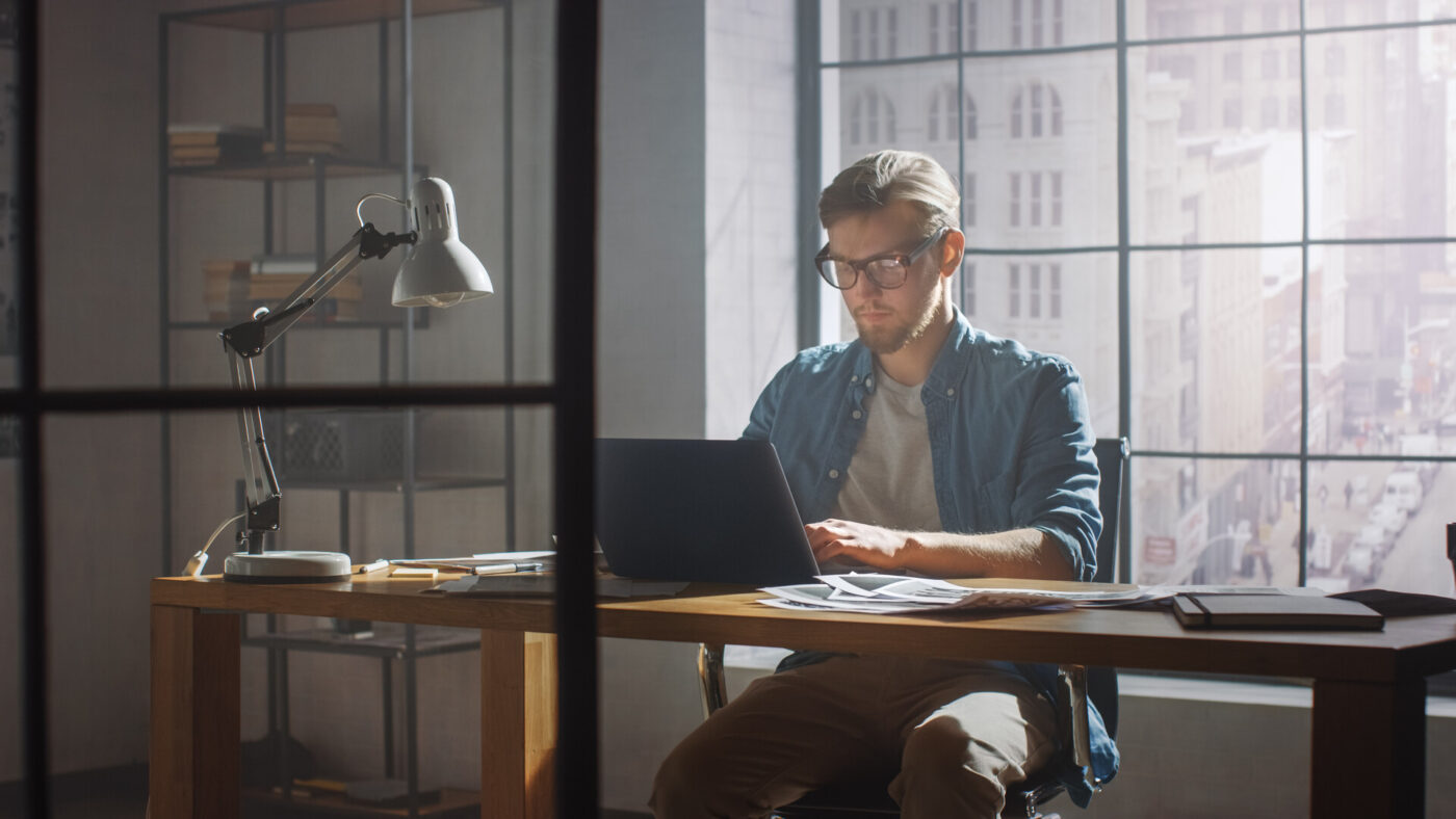 A developer working on a laptop