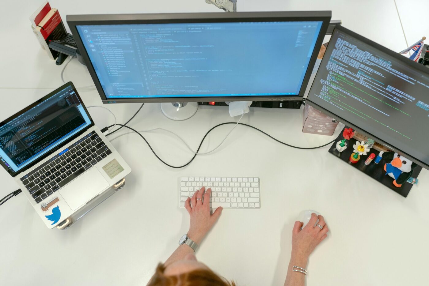 A developer coding on a computer