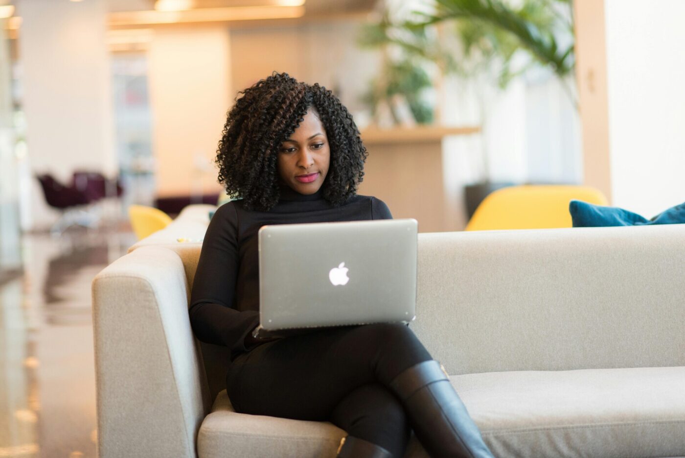 A woman working on a laptop